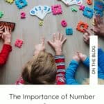 children playing with numbers and maths resources on a wooden floor